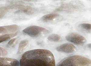 Gathering Prints: Ireland, Kinard. Close-up of wave on smooth beach rocks