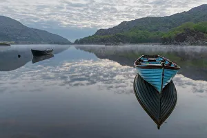 Images Dated 26th November 2022: Ireland, Lough Leane. Boats and reflections on lake