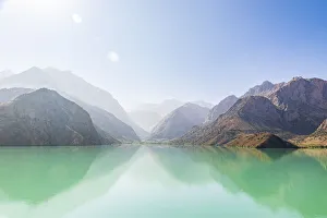 Images Dated 23rd November 2021: Iskanderkul, Sughd Province, Tajikistan. Misty mountains above Iskanderkul Lake