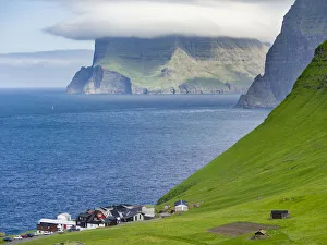 Lonely Prints: Island Kalsoy, village Trollanes, in background the island Kunoy and Vidoy. Nordoyggjar