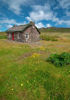 Lonely Prints: Isolated stone cottage weathers storms along the Wild Atlantic Way, County Mayo, Ireland