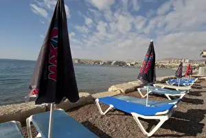 Ellen Clark Prints: Israel, Eilat, beach lounge chairs and umbrellas along the sea at this popular resort