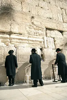 Images Dated 16th January 2012: Israel, Jerusalem. Jewish orthodox men pray at the Western Wall in Jerusalem