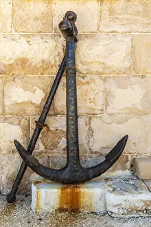 Anchor Prints: Italy, Apulia, Metropolitan City of Bari, Giovinazzo. Old rusted anchor in front of a