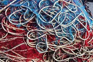Elevated View Prints: Italy, Apulia, Province of Lecce, Gallipoli. Texture detail of fishing nets in red, white