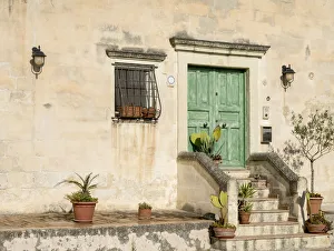 Images Dated 7th March 2019: Italy, Basilicata, Matera. Plants adorn the outside walls of the Sassi houses