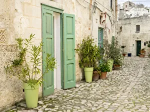 Italy, Basilicata, Matera. Plants adorn the outside walls of the Sassi houses