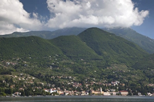 Modern Prints: ITALY, Brescia Province, Gardone Riviera. Distant town view with mountains