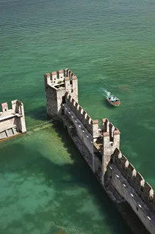 Images Dated 22nd May 2009: Italy, Brescia Province, Sirmione. Castello Scaligero, b. 1250, view of the castle moat