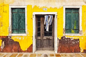 Italy, Burano. Weathered house exterior. Credit as: Jim Nilsen / Jaynes Gallery / DanitaDelimont