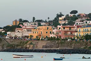 Campania Prints: ITALY-Campania-(Bay of Naples)-ISCHIA-CASAMICCIOLA TERME: Portside Town Buildings / Sunset
