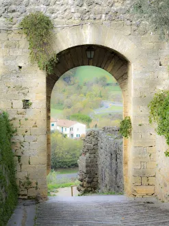 Monteriggioni Prints: Italy, Chianti, Monteriggioni. Looking out an arched entrance into the walled town