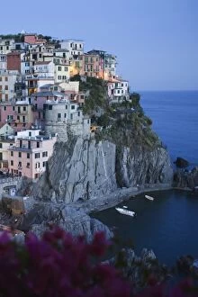 Italy, Cinque Terre, Manarola. Dusk on a coastline town