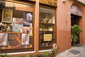 Side Walk Prints: Italy, Dozza. A town store front