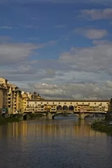 Italy, Florence, Reflections in the River Arno and the Ponte Vecchio Bridge