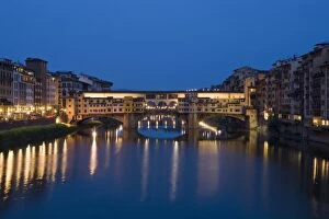 Italy, Florence. Twilight over the Ponte Vecchio Bridge and Arno River