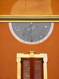 Calendar Prints: Italy, Lago di Orta. Calendar on wall above doorway