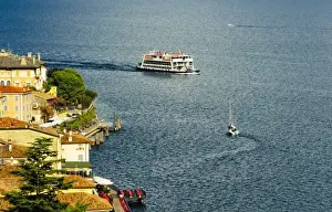 Roof Top Prints: Italy, Lake Garda. A ferry arrives at the lake village of Limone