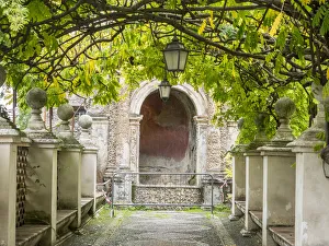 Images Dated 8th April 2019: Italy, Lazio, Tivoli, Villa d Este. Walkway in the gardens of Villa d Este