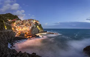 Lighting Prints: Italy, Manarola. Coastal village and sea at sunset