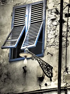 Colorized Prints: Italy, Pisa. Double windows and lamp on old building