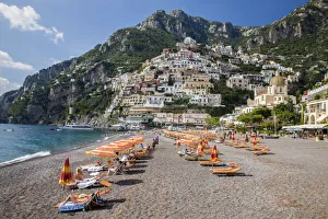 Positano Prints: Italy, Positano. Beautiful Beach of the Town of Positano with sunbathers