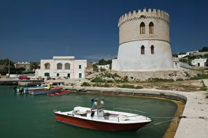 Images Dated 29th May 2005: Italy, Puglia, Torre San Giovanni, Town View from the Seashore