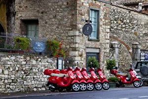 Images Dated 2022: Italy, Radda in Chianti. Vespa scooters for rent in the town of Radda in Chianti