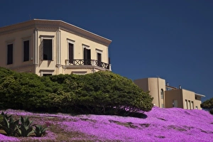 Images Dated 9th May 2009: Italy, Sardinia, Alghero. Beachside villa and flowers