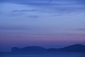 Images Dated 10th May 2009: ITALY, Sardinia, Alghero. Capo Caccia cape, dusk