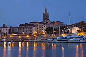 Images Dated 11th May 2009: Italy, Sardinia, Alghero. City walls from the yacht marina, dawn