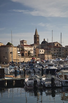 Motorboat Prints: ITALY, Sardinia, Alghero. City from yacht marina