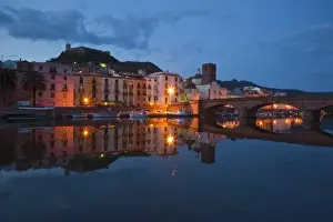 Italy, Sardinia, Bosa. Evening along Temo Riverfront and Ponte Vecchio bridge
