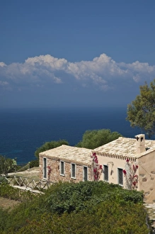 Images Dated 6th May 2009: Italy, Sardinia, Capoterra. Cliffside house
