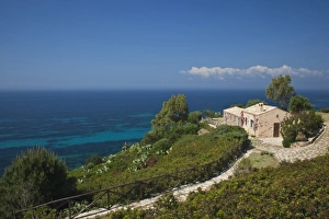 Cagliari Province Prints: Italy, Sardinia, Capoterra. Cliffside house