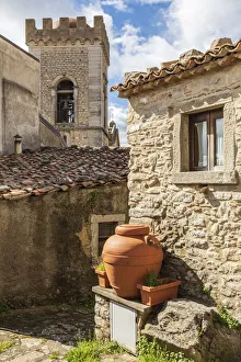 Images Dated 4th February 2020: Italy, Sicily, Messina Province, Montalbano Elicona. Terra cotta urns next to old stone