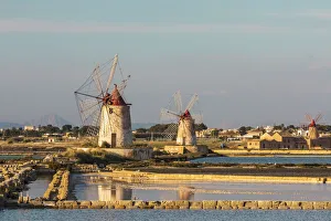 Images Dated 4th February 2020: Italy, Sicily, Trapani Province, Marsala. Wind mills at the salt evaporation ponds in