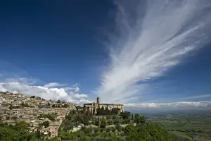 Montalcino Prints: Italy, Tuscany. Dramatic clouds over the hill town of Montalcino