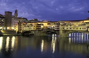 Ponte Vecchio Prints: Italy, Tuscany, Florence. Evening view of Ponte Vecchio from Arno River