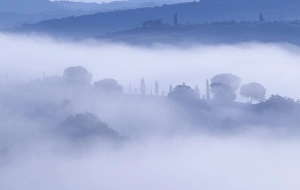 Pienza Prints: Italy, Tuscany, Pienza. Morning fog over town