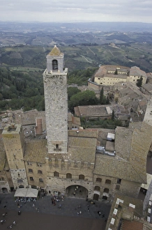 Piazza Prints: Italy, Tuscany, San Gimignano 13th C. towers and plaza in hill town viewed