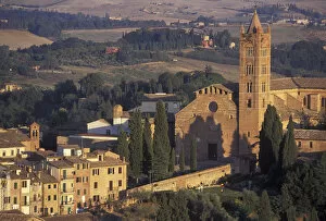 Italy, Tuscany, Siena. The Basilica di Santa Maria dei Servi with people practicing