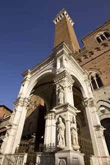 Sienna Prints: Italy, Tuscany, Sienna. Looking straight up at the Cappella di Piazza and tower of Torre del Mangia