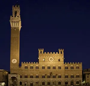 Sienna Prints: Italy, Tuscany, Sienna. Torre del Mangia in the Piazza del Campo at dusk