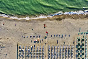 Images Dated 28th July 2020: Italy, Tuscany, Torre del Lago Puccini, boathouse and neatly ordered beach chairs