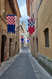 Umbria Prints: Italy, Umbria. Streets in the historic district of San Gemini decked out with festival jousting flags