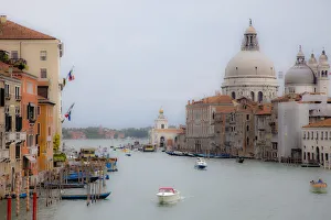Images Dated 21st March 2022: Italy, Venice. Buildings along the Grand Canal with Santa Maria della Salute beyond