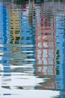 Images Dated 16th May 2006: Italy, Venice, Burano. Multicolored houses reflected in water