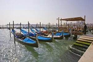 Images Dated 12th October 2005: Italy, Venice, Grand Canal. Gondolas lined up awaiting rental