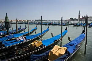 Cover Prints: Italy, Venice. A row of gondolas docked near San Marco Square